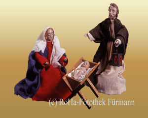 Maria und Josef mit dem Jesuskind in der Krippe
